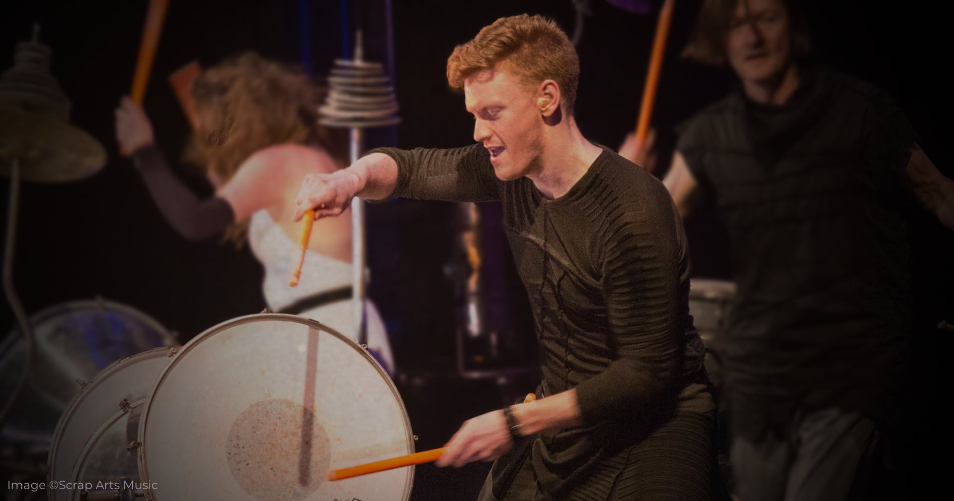Alex Campbell performing with Scrap Arts Music