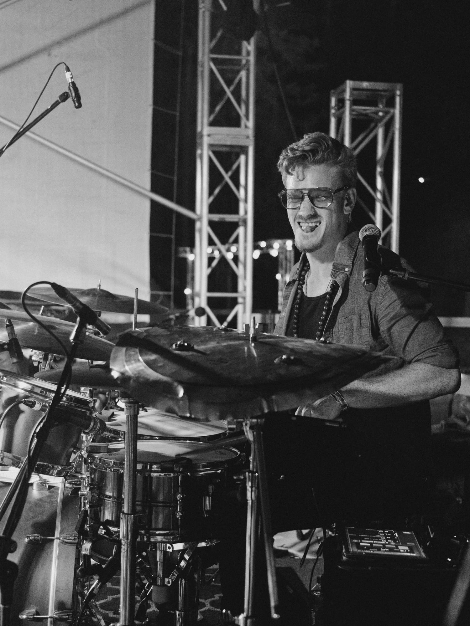 Alex behind the kit on a festival stage